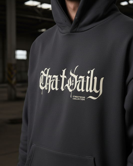 Charcoal hoodie close-up with model